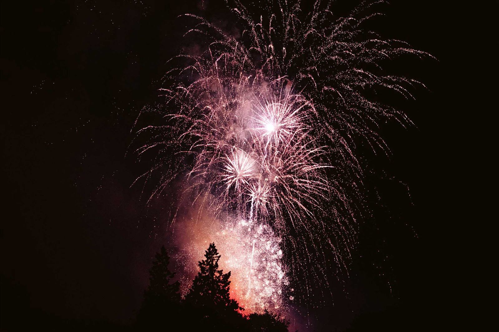 Wedding fireworks display above a great house